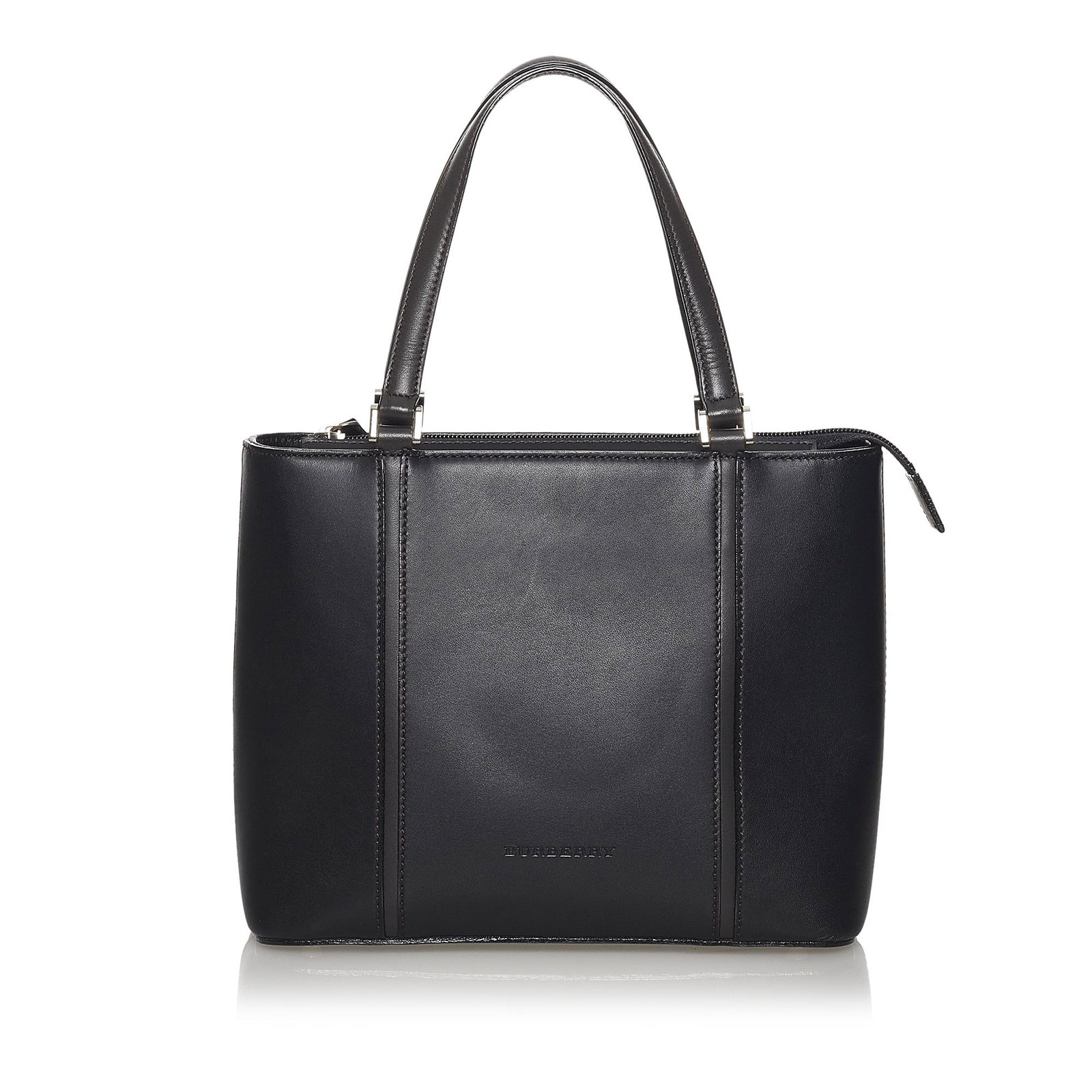 Burberry Leather Handbag: Burberry Leather Handbag This shoulder bag features a leather body flat leather straps a top zip closure and interior zip and slip pockets. Brand: Burberry Model: Leather Handbag Origin: United Kingdo