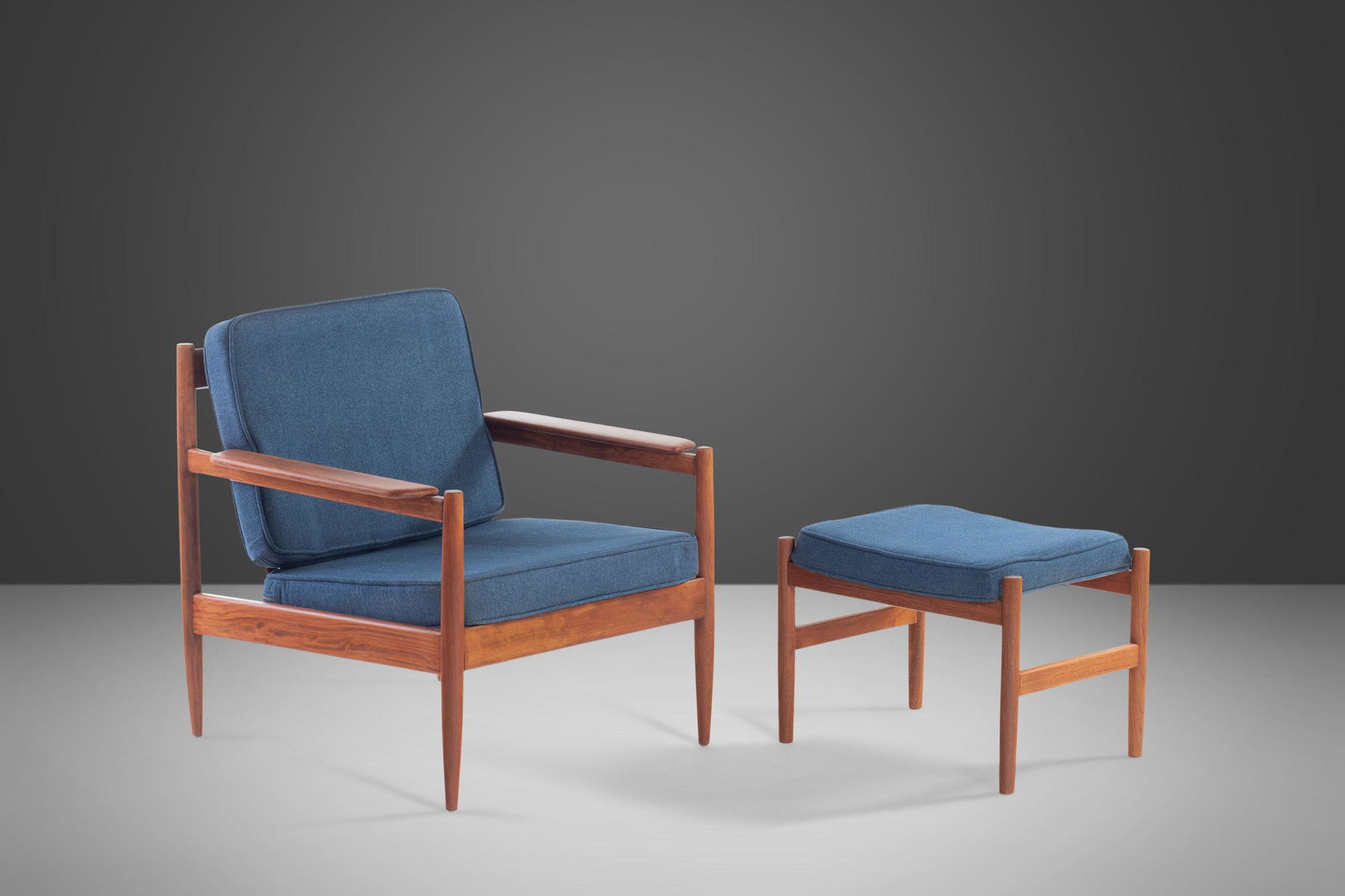 Lounge Chair and Ottoman Attributed to Arne Vodder in Teak w/ New Blue Knit Upholstery c. 1960s: Lounge Chair and Ottoman Attributed to Arne Vodder in Teak w/ New Blue Knit Upholstery c. 1960s About: Constructed from teak with a pleasing angular design. The set has been newly upholstered in a stu