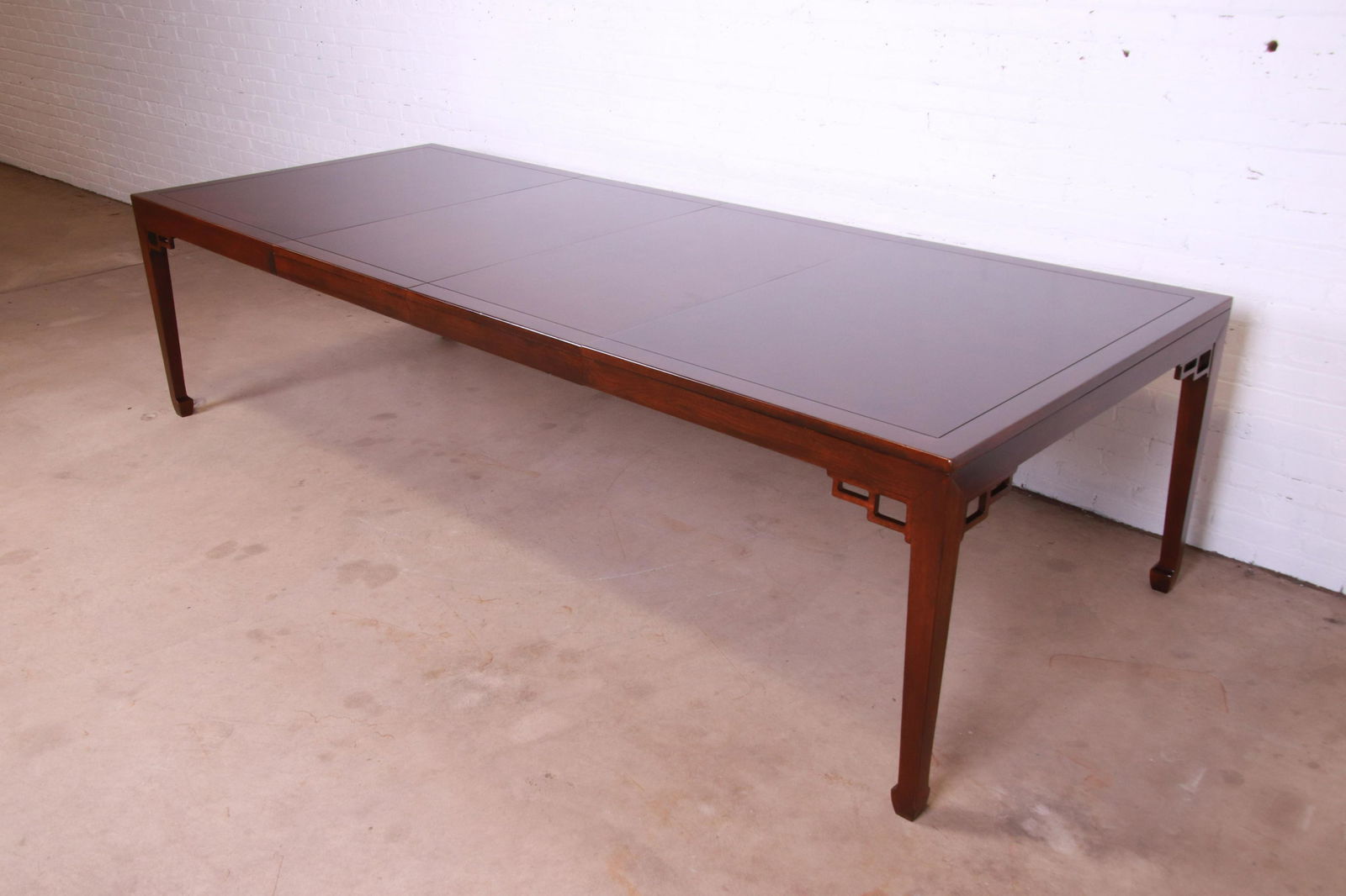 Michael Taylor for Baker Furniture Chinoiserie Burled Walnut Extension Dining Table 1950s: Michael Taylor for Baker Furniture Chinoiserie Burled Walnut Extension Dining Table 1950s An exceptional mid-century modern Hollywood Regency Chinoiserie extension dining table By Michael Taylor for B