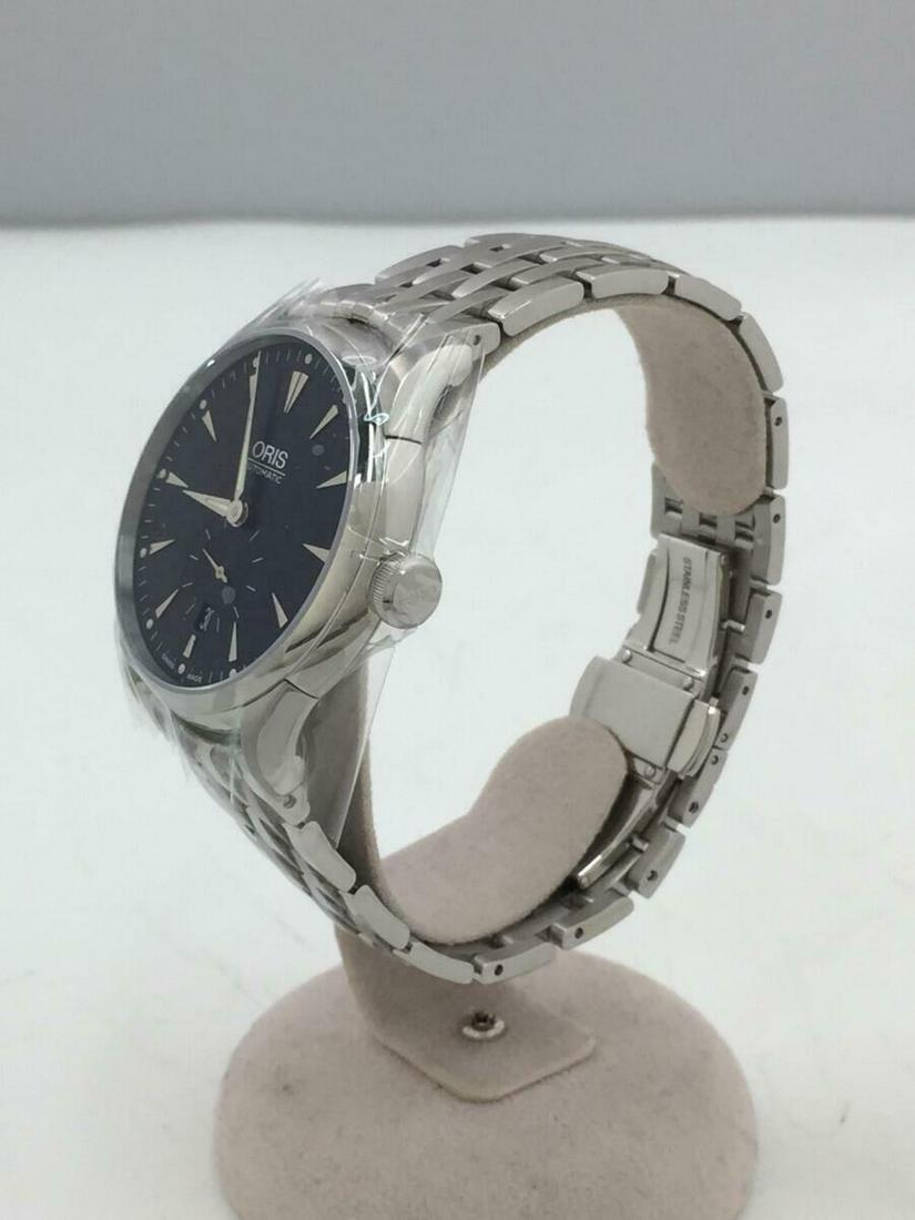 ORIS 7582 Self-winding Analog Stainless Steel Silver Automatic Men's Watch: ORIS 7582 Self-winding Analog Stainless Steel Silver Automatic Men's Watch Brand: Oris Type: Wristwatch Pre-Owned The BIDHAUS Guarantee: All items in this auction are guaranteed authentic and come wit