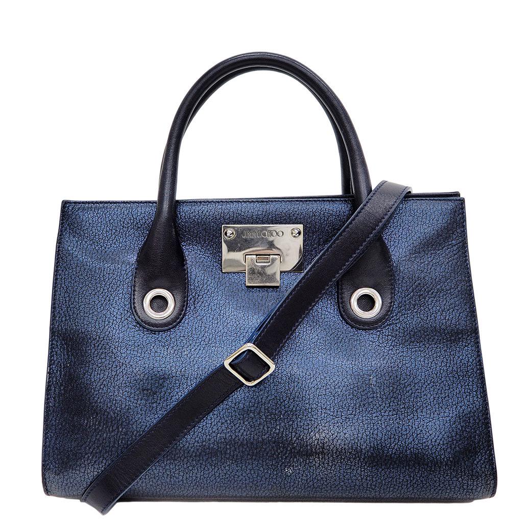 Jimmy Choo JIMMY CHOO Riley Handbag: Jimmy Choo JIMMY CHOO Riley Handbag Brand: Jimmy Choo Type: Handbag Material: Leather Leather: Color: Navy Size (HxWxD): 23cm x 32cm x 12cm / 9.05 x 12.59 x 4.72 Handle Length: 27cm / 10.62 Strap Leng