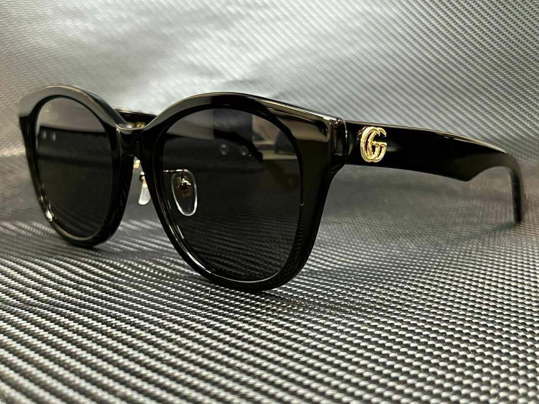 GUCCI GG1002SK 001 Black Round 56 mm Women's: GUCCI GG1002SK 001 Black Round 56 mm Women's Brand: Gucci Department: Women Frame Color: Black Style: Round Type: Sunglasses New The BIDHAUS Guarantee: All items in this auction are guaranteed authent