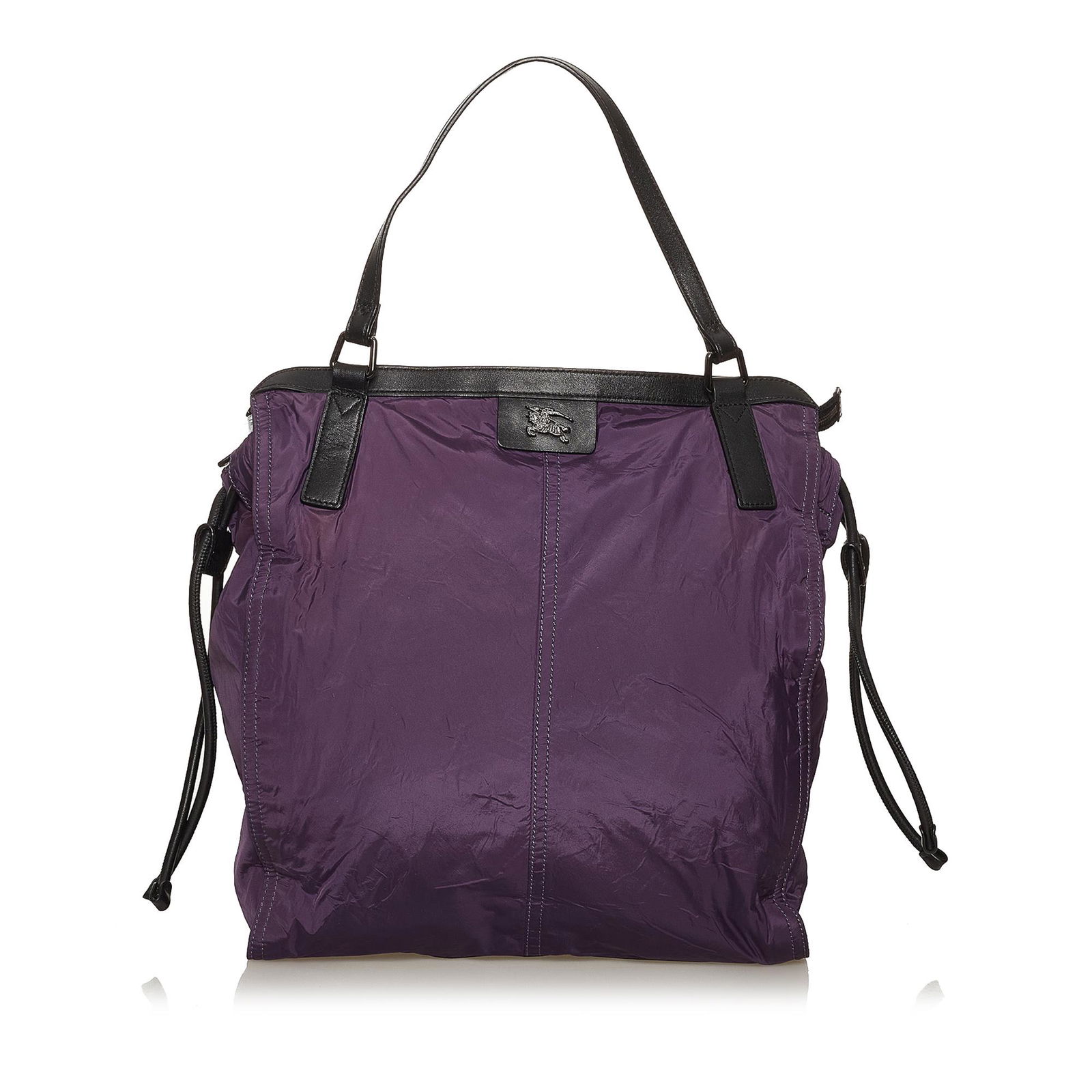 Burberry Buckleigh Nylon Tote Bag: Burberry Buckleigh Nylon Tote Bag The Buckleigh tote bag features a nylon body with leather trim flat leather straps a top zip and drawstring closure and an interior zip pocket. Brand: Burberry Model: