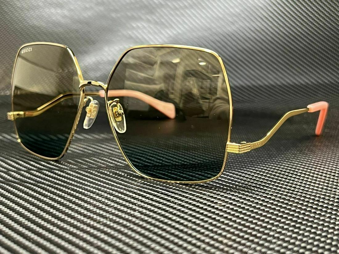 GUCCI GG1005S 001 Gold Hexagonal 61 mm Women's Sunglasses: GUCCI GG1005S 001 Gold Hexagonal 61 mm Women's Sunglasses Brand: Gucci Frame Color: Gold Type: Sunglasses New The BIDHAUS Guarantee: All items in this auction are guaranteed authentic and come with a