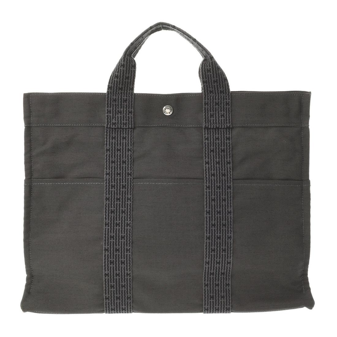 HERMES Hermes Aleline MM Gray Unisex Canvas Tote Bag: HERMES Hermes Aleline MM Gray Unisex Canvas Tote Bag Brand: Hermes Line: Her Line Type: Tote bag Material: Canvas Canvas: Color: Gray Closure: Zipper Gender: Men Unisex Size (HxWxD): 32cm x 42.5cm x 1