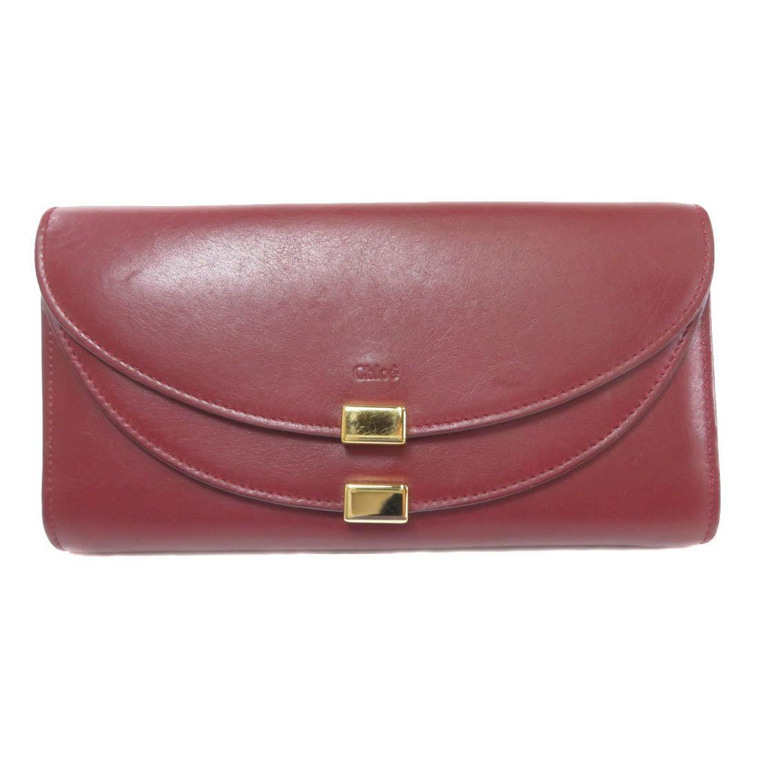 Chloe logo motif long wallet bi-fold leather ladies: Chloe logo motif long wallet bi-fold leather ladies Brand: Chloe Model: Logo motif Type: Wallet (bi-fold) Gender: Women Material: Leather Leather: Color: Bordeaux Red color Closure: Button Snap fasten