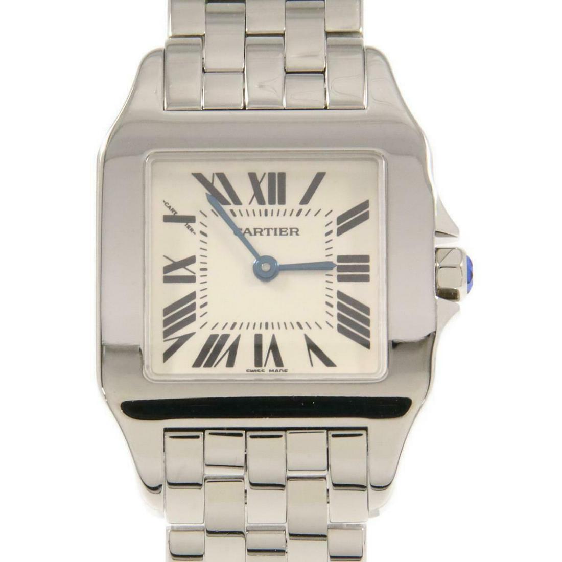 Cartier W25065Z5 Santos Demoiselle Quartz: Cartier W25065Z5 Santos Demoiselle Quartz Brand: Cartier Color: Silver Roman - Size: Case diameter 26mmx37mm Max Arm size: 15.5cm Additionalinfo: Quartz water resistant Type: Wristwatch AB: Very Good 