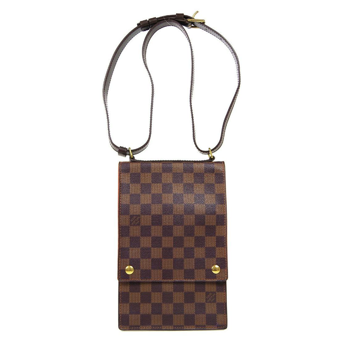 LOUIS VUITTON PORTOBELLO SHOULDER BAG VI0021 CLEAR POCKET DAMIER N45271: LOUIS VUITTON PORTOBELLO SHOULDER BAG VI0021 CLEAR POCKET DAMIER N45271 Size: Medium Accents: Logo Model: Damier Style: Cross Body Bag Handle Style: Shoulder Strap Bag Height: 10.2 Product Line: PORTO