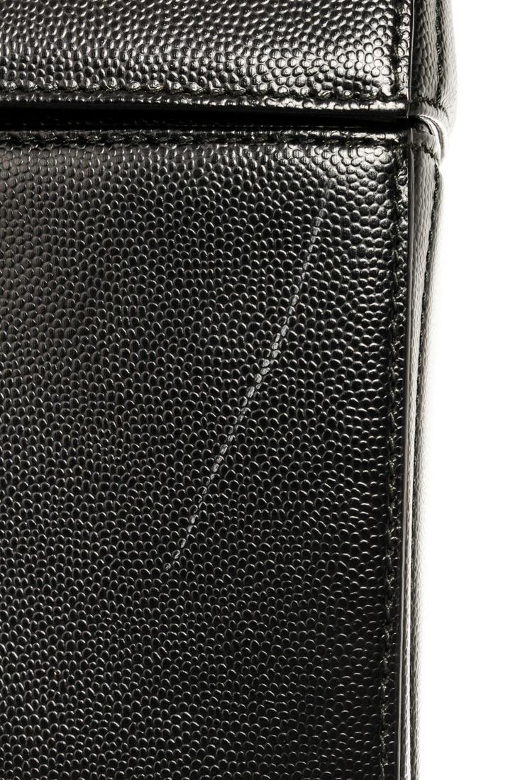 Mark Cross Black Leather Sara Top Handle Bag: Mark Cross Black Leather Sara Top Handle Bag This creation from Mark Cross is a structured bag made with black leather and gold-tone hardware. It comes with a top handle a long detachable crossbody st