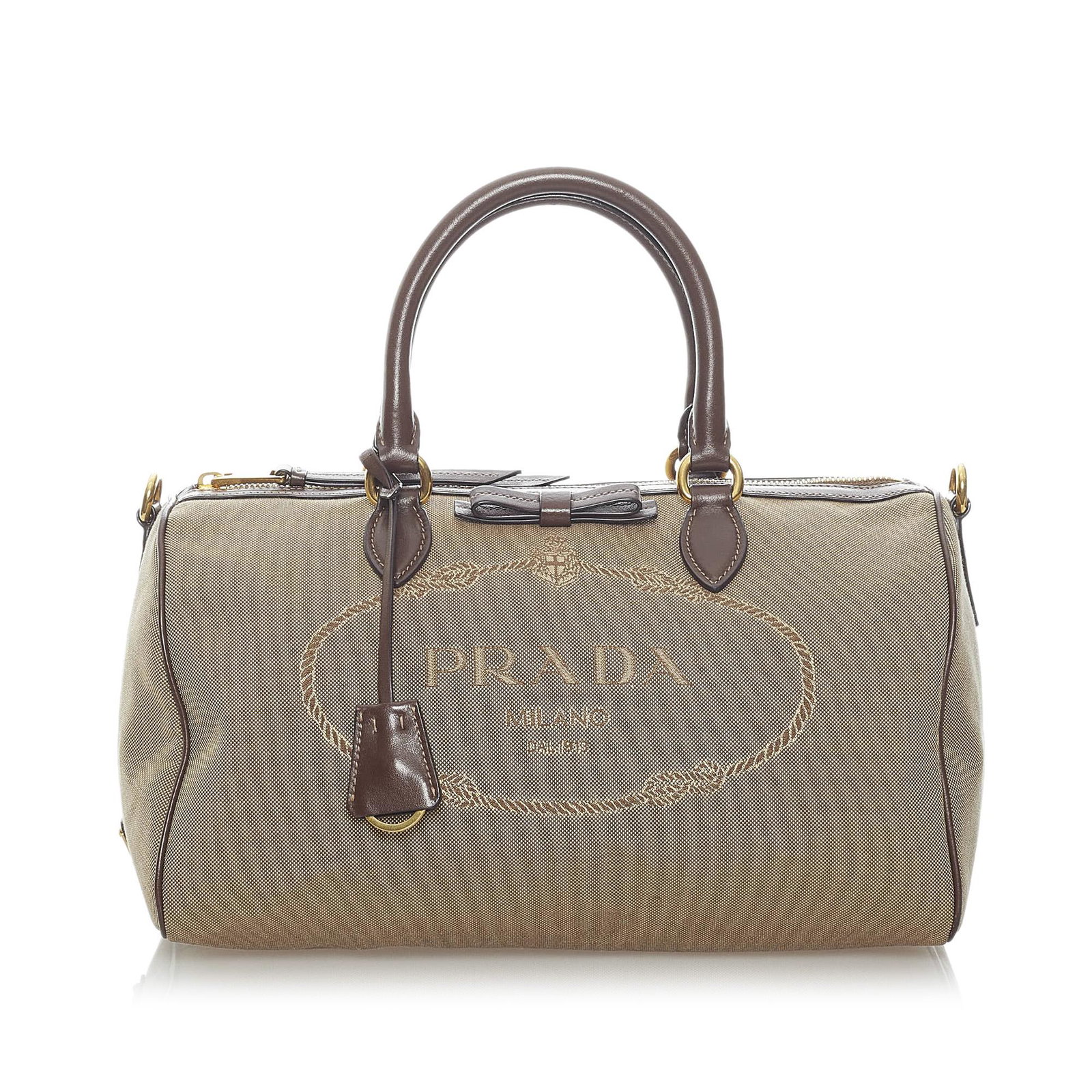 Prada Canapa Logo Canvas Boston Bag: Prada Canapa Logo Canvas Boston Bag The Canapa Logo boston features a canvas body with leather trim rolled leather handles a detachable flat leather strap an open top with a magnetic snap closure an i