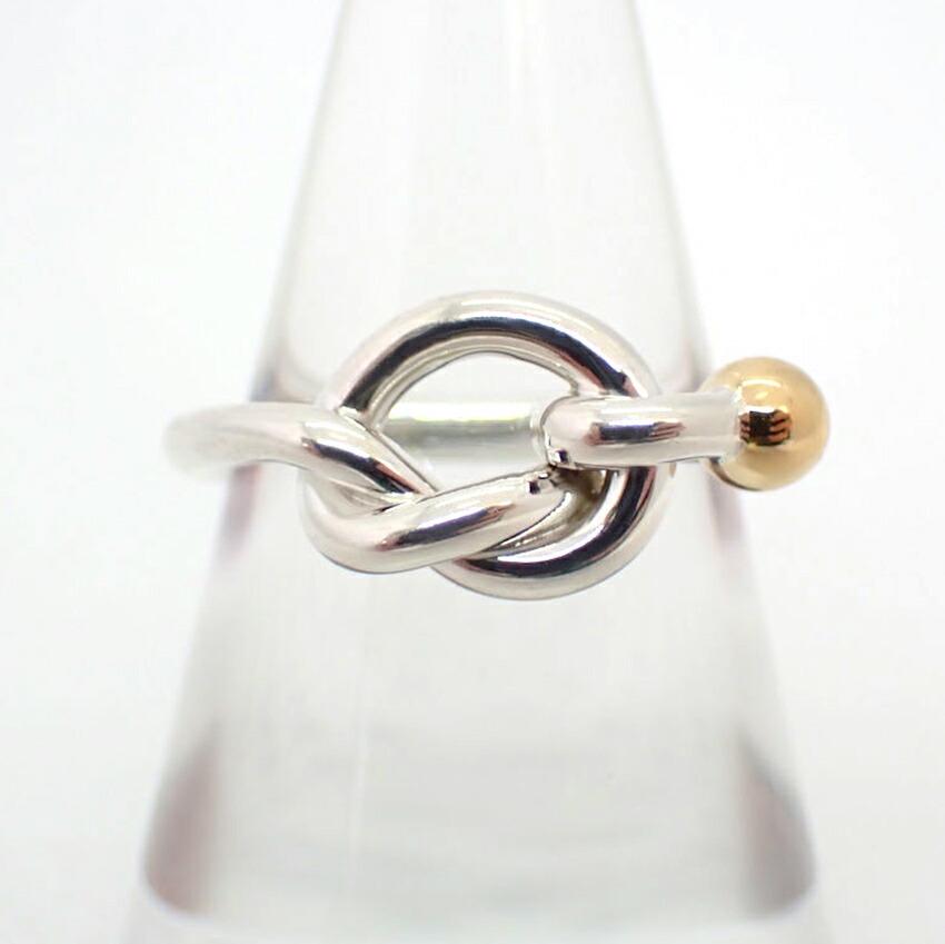 TIFFANY / Tiffany SV925 750 Combi Love Knot Ring No. 9.5: TIFFANY / Tiffany SV925 750 Combi Love Knot Ring No. 9.5 Brand: Tiffany Color: Yellow Material: Sterling silver 925 Yellow gold (18K) US Size: 5 Weight: 2.8g / 0.09oz. Condition: Used (very good) Over