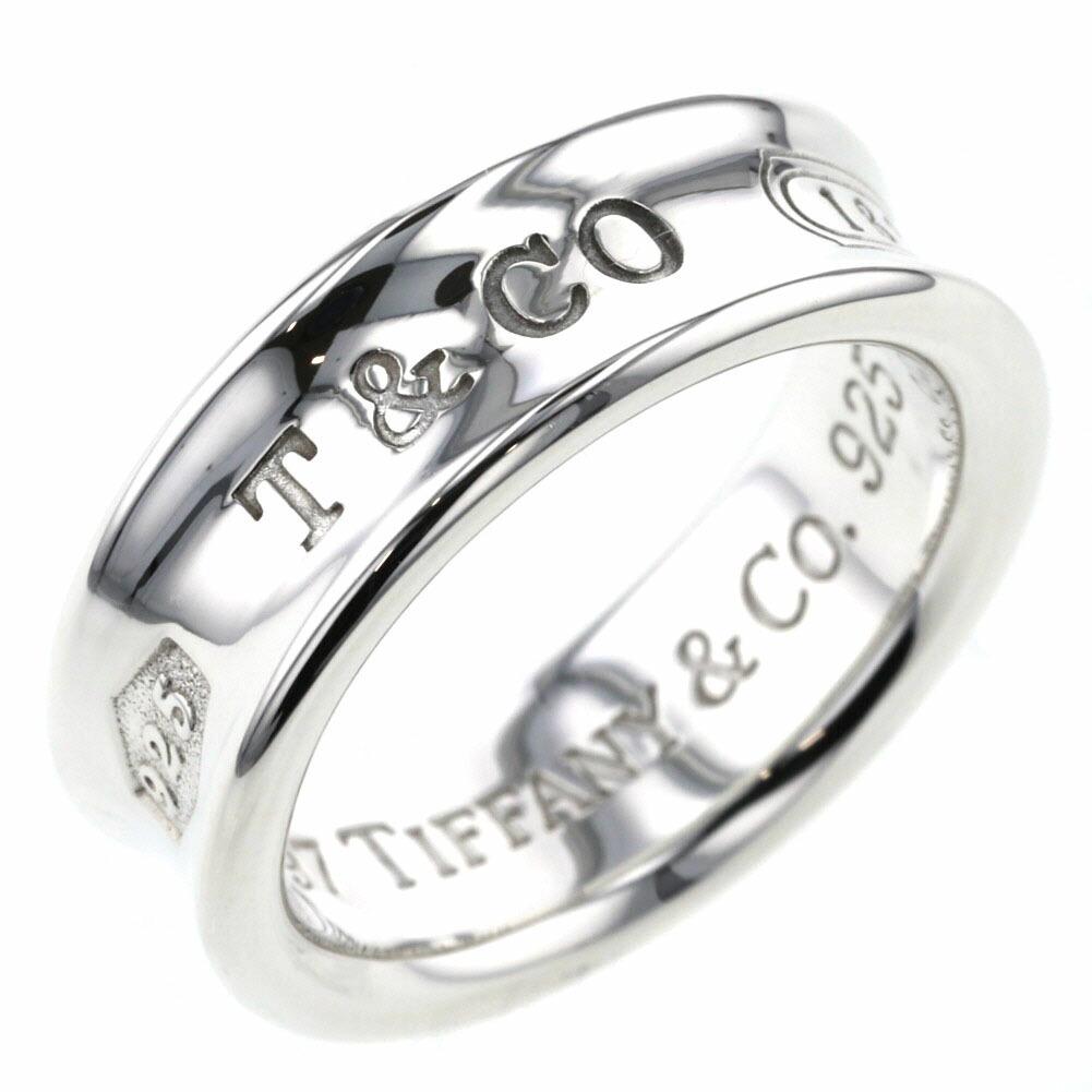 Tiffany Ring 1837 Width approx. 7mm Silver 925 Ladies TIFFANY & Co.: Tiffany Ring 1837 Width approx. 7mm Silver 925 Ladies TIFFANY & Co. Brand: Tiffany Line: 1837 Gender: Women Color: Silver Material: Silver 925 US Size: 7.5-8 Width: 7mm / 0.28 Inner Diameter: 17.00mm 