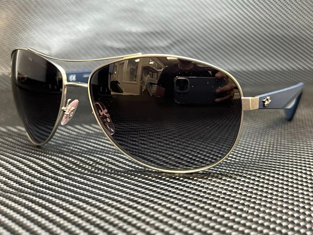 RAY BAN RB3526 019 8G Matte Silver Pilot Men's 63 mm Sunglasses: RAY BAN RB3526 019 8G Matte Silver Pilot Men's 63 mm Sunglasses Lens Material: Plastic Type: Sunglasses Frame Material: Acetate Brand: Ray Ban Frame Color: Silver New The BIDHAUS Guarantee: All items 