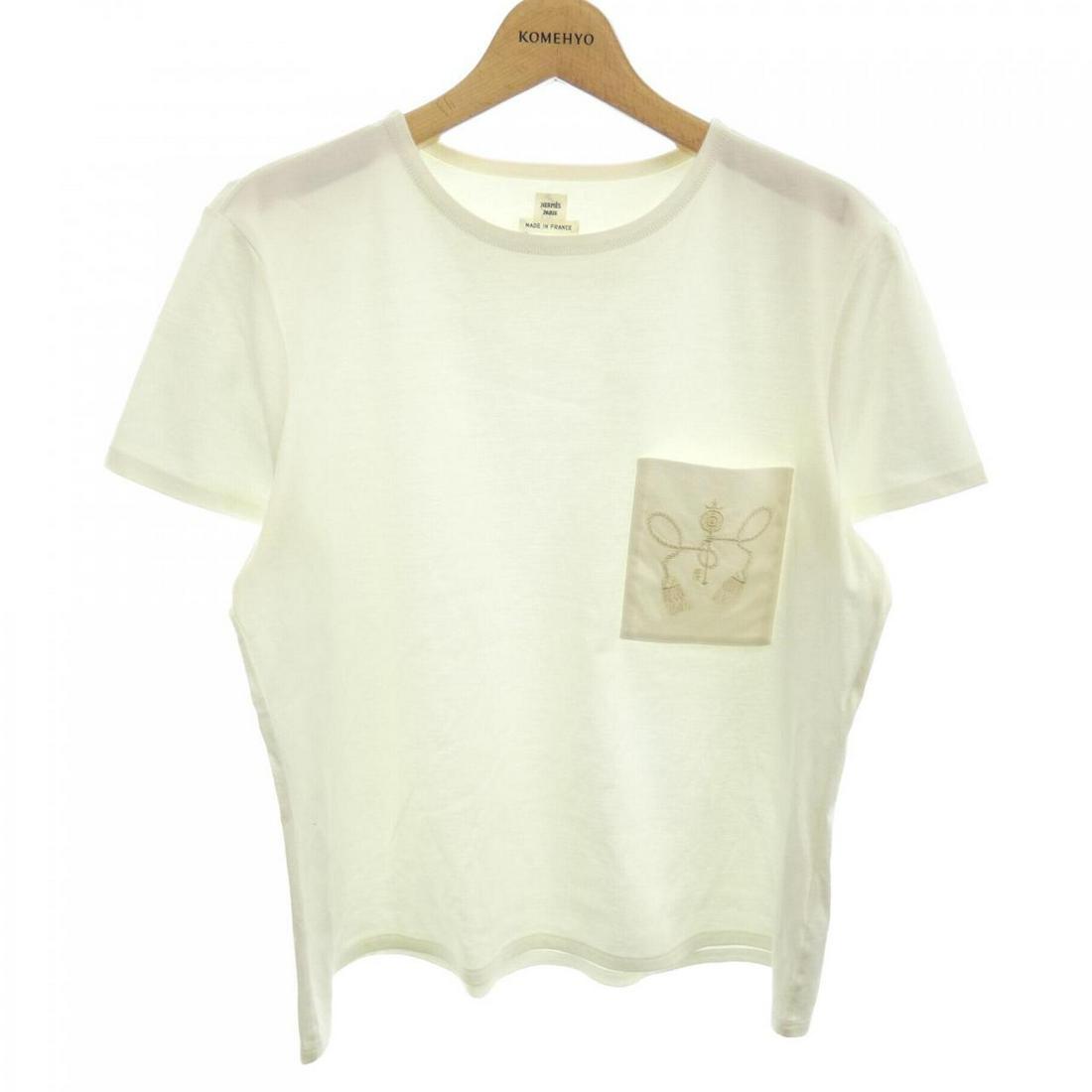 HERMES Tshirt: HERMES Tshirt Brand: HERMES Style: T-SHIRT Color: White A feeling of sheerness. "Gender: Ladies " Size: 42 Size Type: Regular Type: T-SHIRT B: Reasonable Wear and Tear The BIDHAUS Guarantee: All items