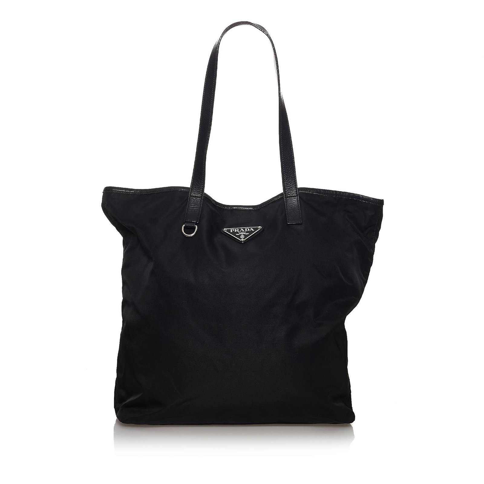 Prada Tessuto Tote Bag: Prada Tessuto Tote Bag This tote bag features a nylon body flat leather straps a top zip closure and an interior zip pocket. Brand: Prada Model: Tessuto Tote Bag Origin: Italy Category: Bags Color: Bl