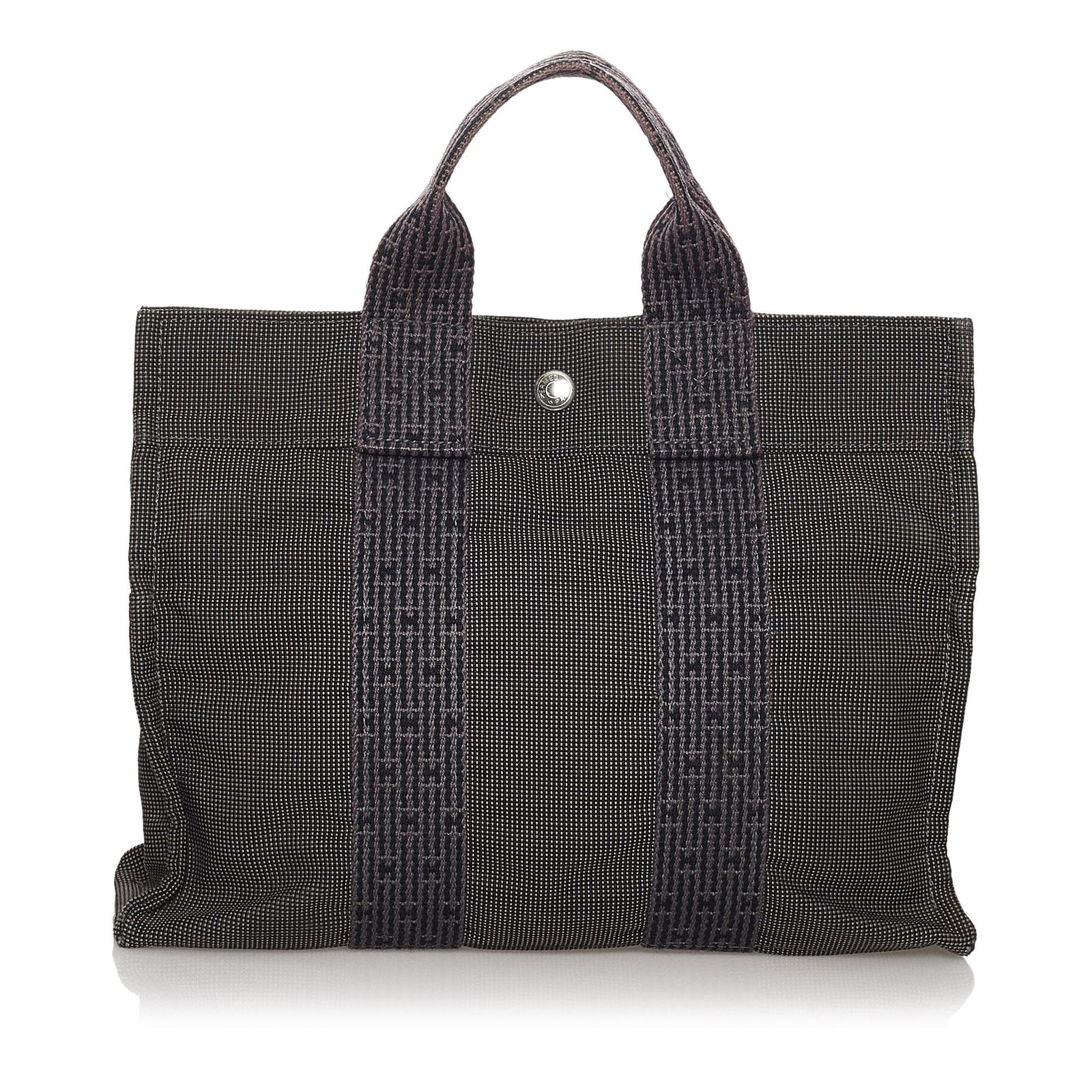 Hermes Fourre Tout PM: Hermes Fourre Tout PM The Fourre Tout PM features a canvas body flat straps an open top with a snap closure and an interior zip compartment. Brand: Hermes Model: Fourre Tout PM Origin: France Category