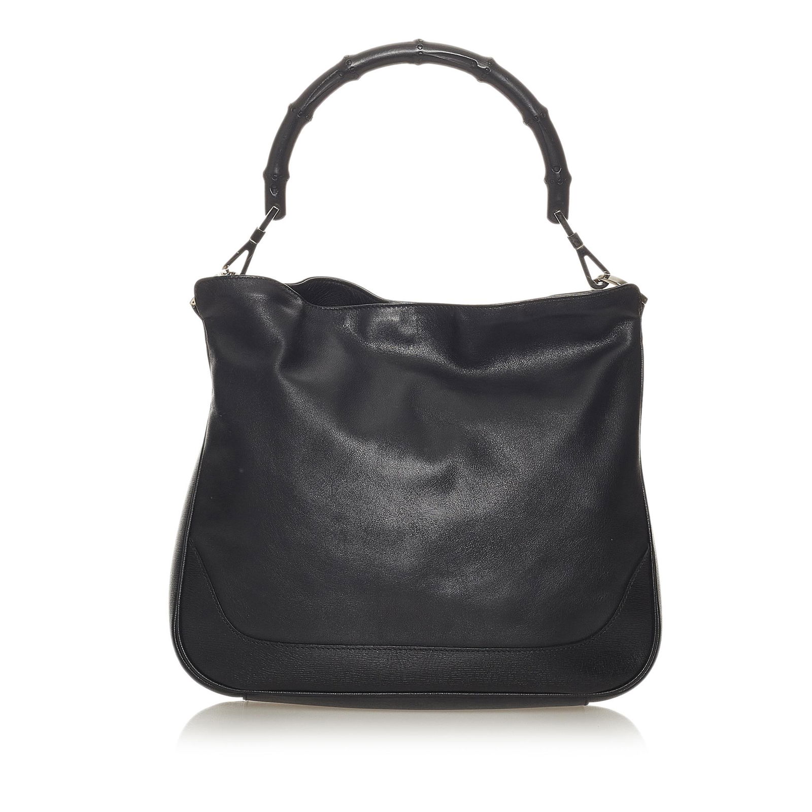 Gucci Bamboo Leather Satchel: Gucci Bamboo Leather Satchel This satchel features a leather body a bamboo handle a detachable flat leather strap an open top with magnetic snap button closure and an interior zip pocket. Brand: Gucci