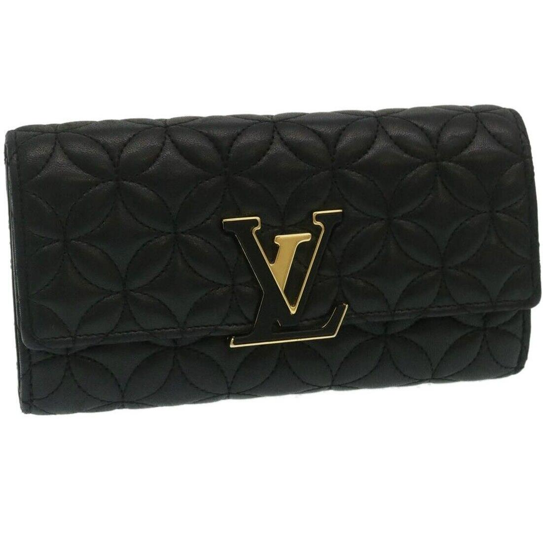 LOUIS VUITTON Portefeuille Capsine Long Wallet Lamb Skin Black M68590: LOUIS VUITTON Portefeuille Capsine Long Wallet Lamb Skin Black M68590 Brand: LOUIS VUITTON Style: Long Wallet Material: Leather Color: Black Bag Height: 3.9inch(Approx) / 10cm(Approx) Bag Depth: 1.4in