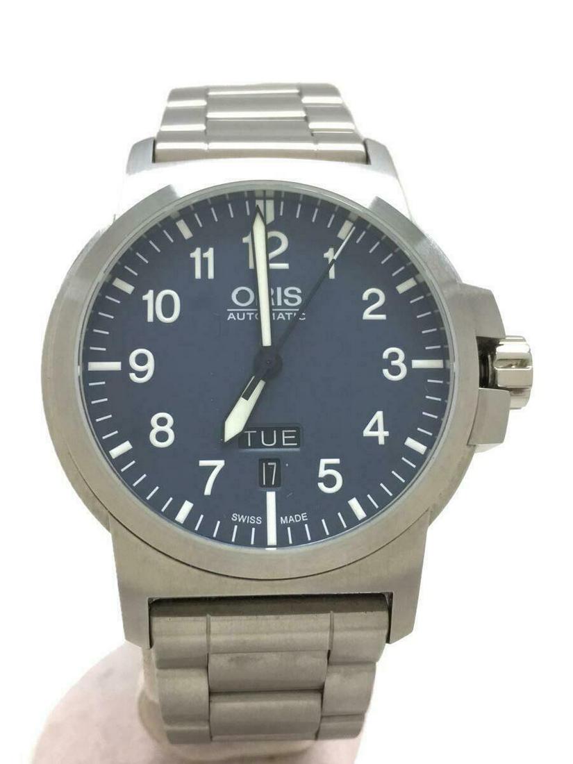 ORIS Self-winding Analog Stainless Steel Navy Silver Automatic Men's Watch: ORIS Self-winding Analog Stainless Steel Navy Silver Automatic Men's Watch Brand: Oris Type: Wristwatch Department: Mens Pre-Owned The BIDHAUS Guarantee: All items in this auction are guaranteed authe