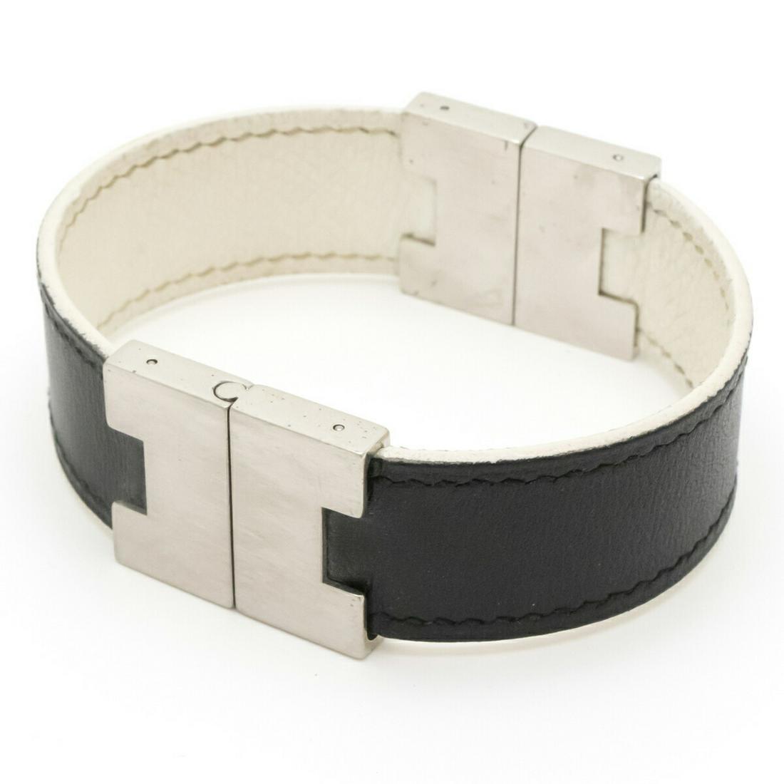 HERMES Hermes Lurie Bracelet Bangle Reversible Leather Black White: HERMES Hermes Lurie Bracelet Bangle Reversible Leather Black White Brand: Hermes Type: Charm bracelet Material: Leather Color: Black White Total Length: 17.5cm / 6.88 Overall Scratches: Insignificant