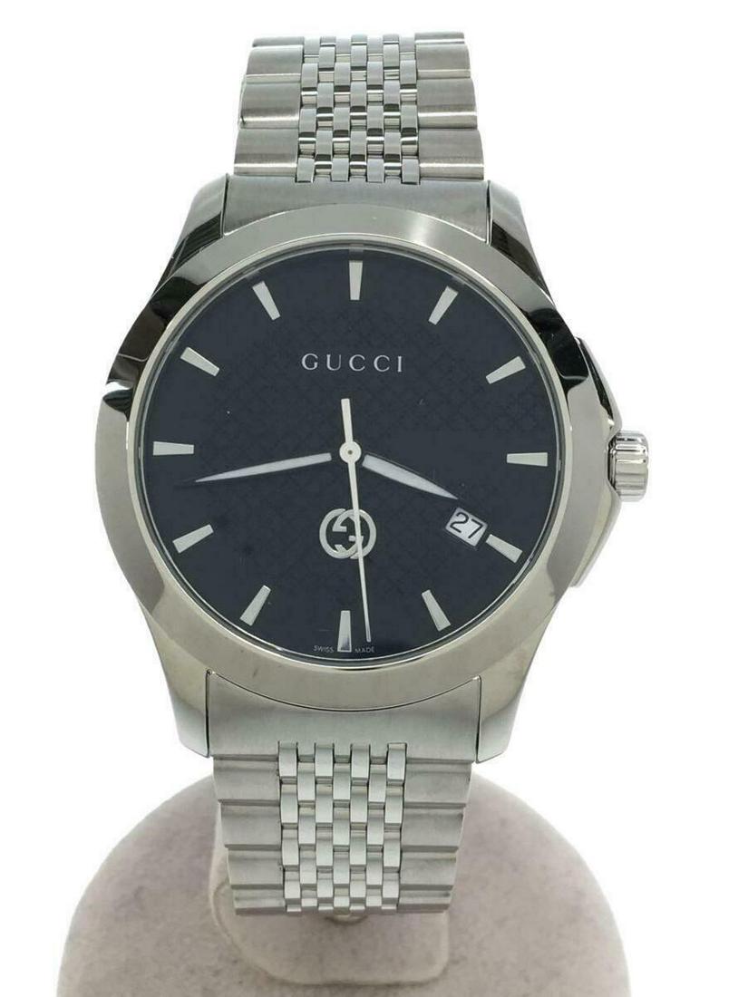 GUCCI Quartz Analog Stainless Silver Black Water Resistant Men's Watch: GUCCI Quartz Analog Stainless Silver Black Water Resistant Men's Watch Brand: Gucci Type: Wristwatch Pre-Owned The BIDHAUS Guarantee: All items in this auction are guaranteed authentic and come with a
