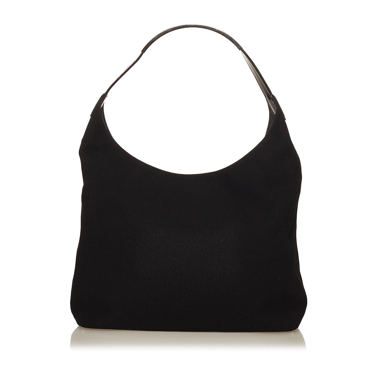 Gucci Nylon Shoulder Bag: Gucci Nylon Shoulder Bag This shoulder bag features a nylon body with leather trim a flat strap an open top with magnetic snap button closure and an interior zip pocket. Brand: Gucci Model: Nylon Shou