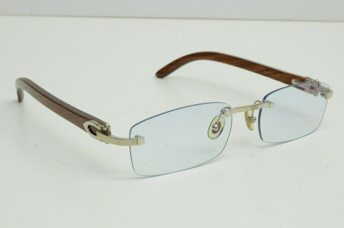 Cartier Eyeglasses Rimless 53 18 135b Bubinga Wood Rectangle: Cartier Eyeglasses Rimless 53 18 135b Bubinga Wood Rectangle Lens Material: N/A Character: bubinga decor Model: Cartier Decor Country/Region Of Manufacture: France Department: Men Style: Rectangle Tem