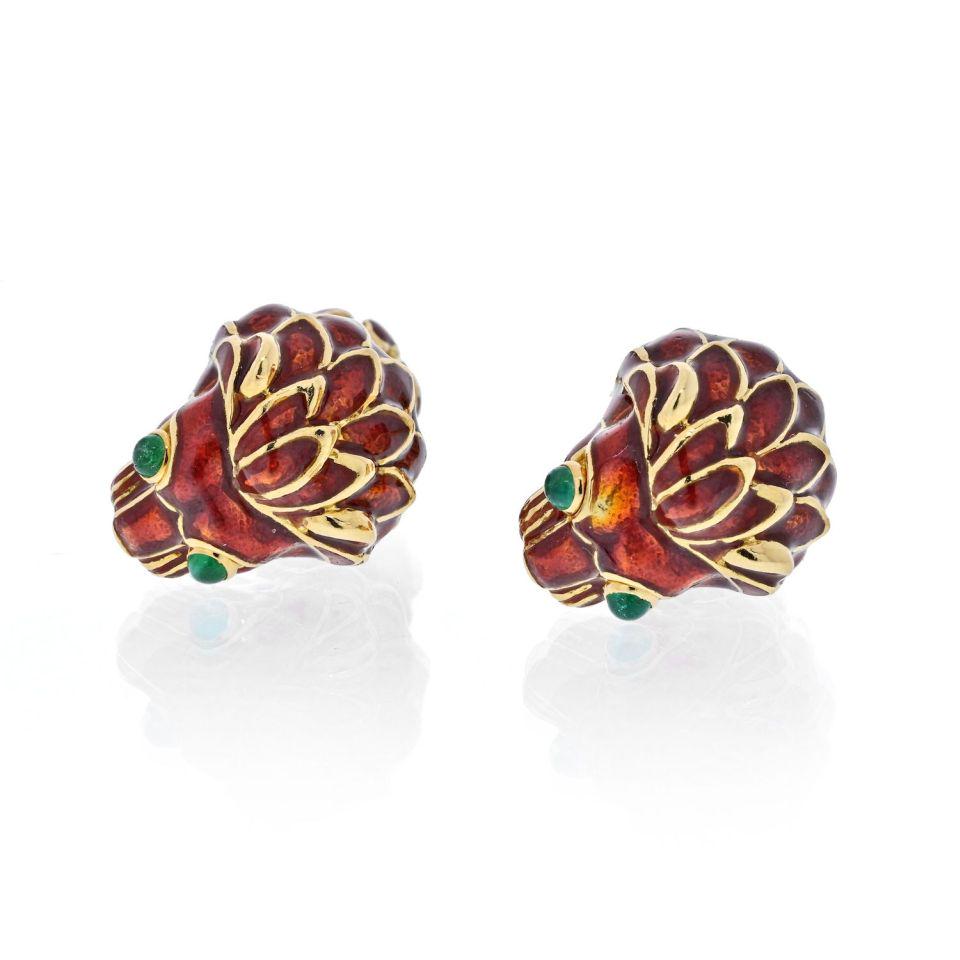 David Webb 18K Yellow Gold Red Enamel Lion Heads Cuff Links: David Webb 18K Yellow Gold Red Enamel Lion Heads Cuff Links Type: Cuff Links Metal: 18K Yellow Gold Grams: 32 Measurements: Length: 1.13 in. (28.71 mm) Condition: Excellent. Signed By: WEBB Brand: Dav