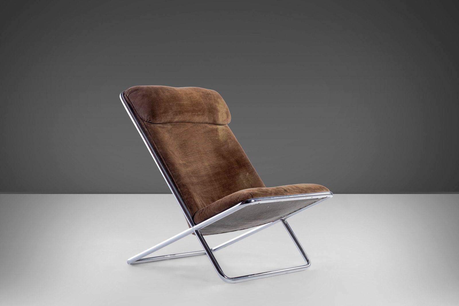 Ward Bennett Scissor Lounge Chair in Original Brown Upholstery on a Striking Chrome Frame c. 1960s: Ward Bennett Scissor Lounge Chair in Original Brown Upholstery on a Striking Chrome Frame c. 1960s About: Designed by Ward Bennett with the perfect attention to angle and line. This Scissor lounge cha