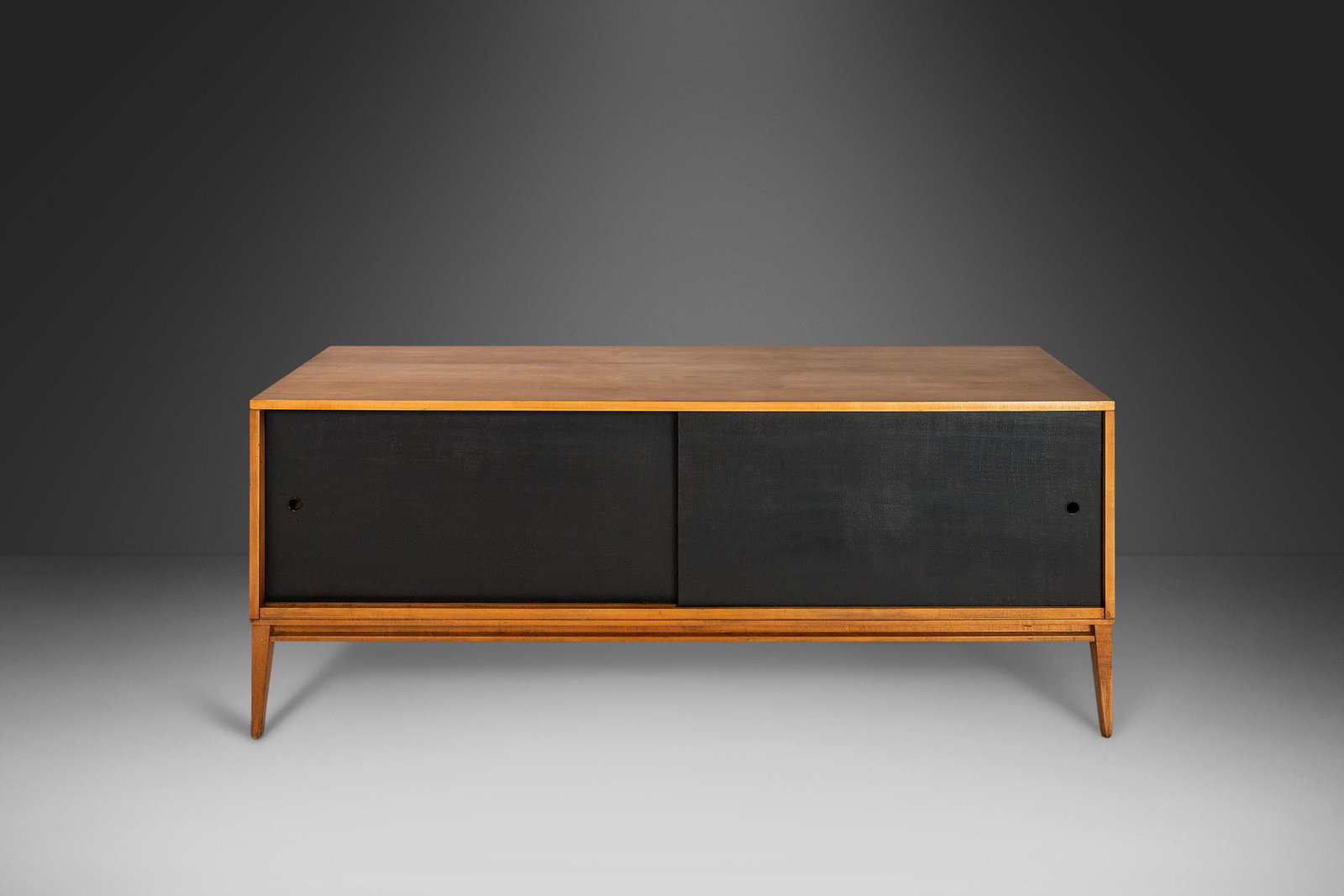 Low Profile Credenza in Maple by Paul Mccobb for Planner Group / Winchendon USA c. 1960s: Low Profile Credenza in Maple by Paul Mccobb for Planner Group / Winchendon USA c. 1960s About: This exquisite credenza designed by the acclaimed and visionary Paul McCobb has recently undergone a com
