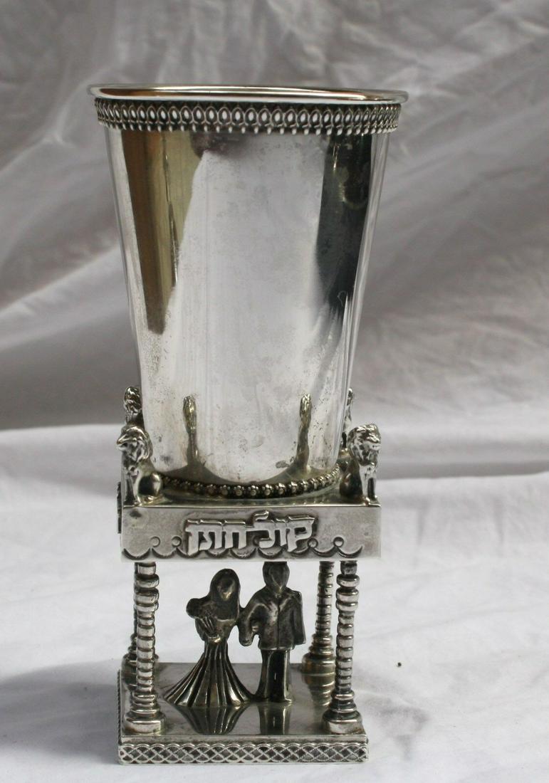 STERLING SILVER JUDAISM WEDDING YIDDISH: STERLING SILVER JUDAISM WEDDING YIDDISH Composition: Sterling Silver This is a sterling silver Judaism wedding yiddish cup. This piece has a wonderful detail workmanship and patina. It showing a coupl
