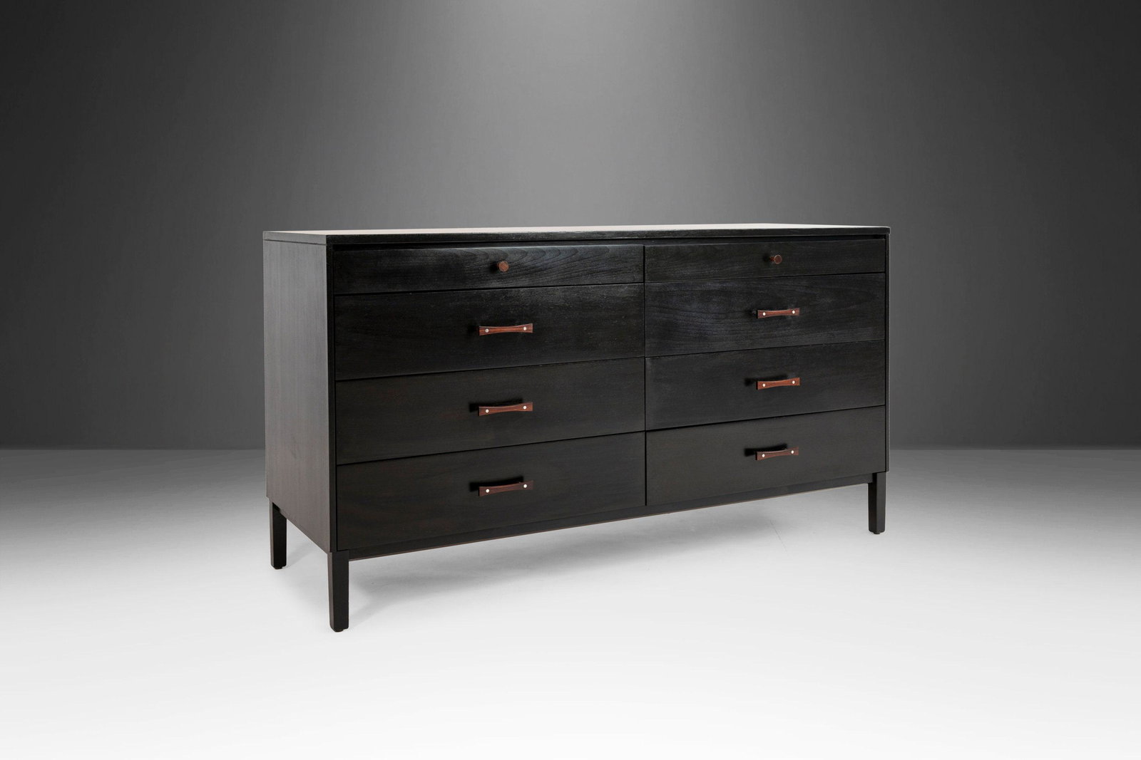 Ebonized Eight Drawer Perimeter Dresser by Paul McCobb for Winchendon Furniture USA c. 1960s: Ebonized Eight Drawer Perimeter Dresser by Paul McCobb for Winchendon Furniture USA c. 1960s About: This exquisite dresser designed by the acclaimed and visionary Paul McCobb has recently undergone a 
