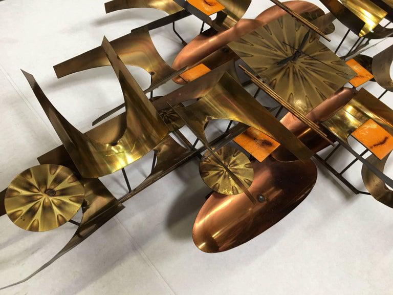 William Vose for Curtis Jere Brass and Copper Brutalist Wall Sculpture Clock: William Vose for Curtis Jere Brass and Copper Brutalist Wall Sculpture Clock Creator: William Vose (Designer) Creator: Curtis Jere (Maker) Dimensions: Height: 22 in. (55.88 cm) Dimensions: Width: 36 i