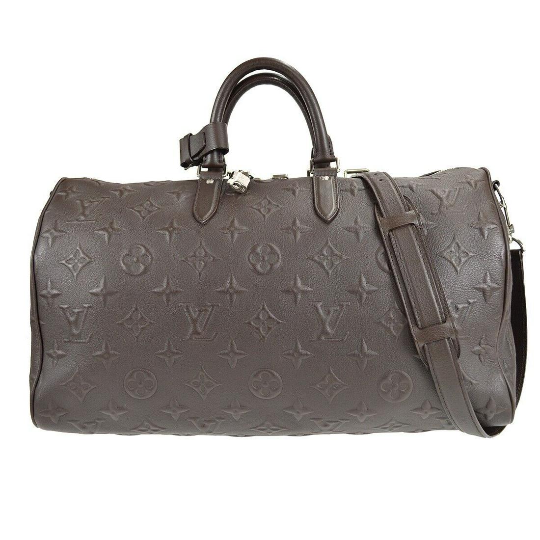 LOUIS VUITTON KEEPALL 45 BANDOULIERE HANDBAG REVELATION M56712 FO2180: LOUIS VUITTON KEEPALL 45 BANDOULIERE HANDBAG REVELATION M56712 FO2180 Bag Width: 18 in Pattern: Monogram Closure: Zip Bag Height: 11 in Handle/Strap Color: Brown Size: Extra Large Handle Style: Double