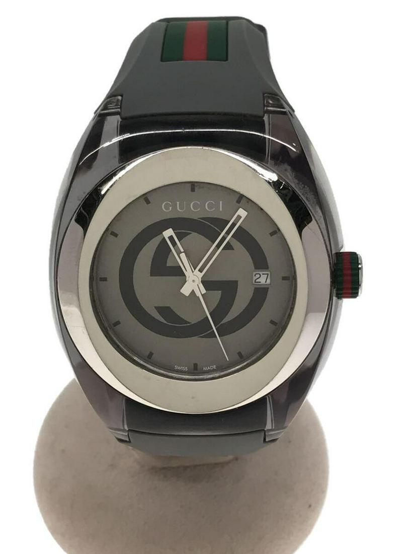 GUCCI 137.1 Sync Quartz Digiana Rubber Gray Stainless Steel Men's Watch: GUCCI 137.1 Sync Quartz Digiana Rubber Gray Stainless Steel Men's Watch Brand: Gucci Type: Wristwatch Pre-Owned The BIDHAUS Guarantee: All items in this auction are guaranteed authentic and come with