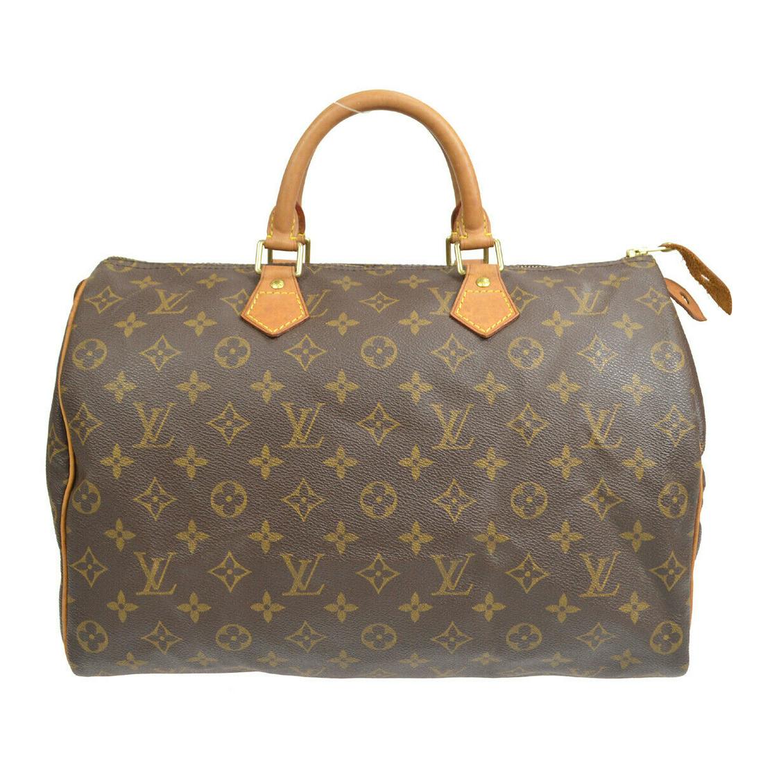 LOUIS VUITTON SPEEDY 35 HAND BAG PURSE MONOGRAM CANVAS M41524 MB0042: LOUIS VUITTON SPEEDY 35 HAND BAG PURSE MONOGRAM CANVAS M41524 MB0042 Bag Width: 13 in Closure: Zip Bag Height: 9 in Size: Medium Handle Style: Double Handles Handle Drop: 4 in Bag Depth: 7 in Exterior