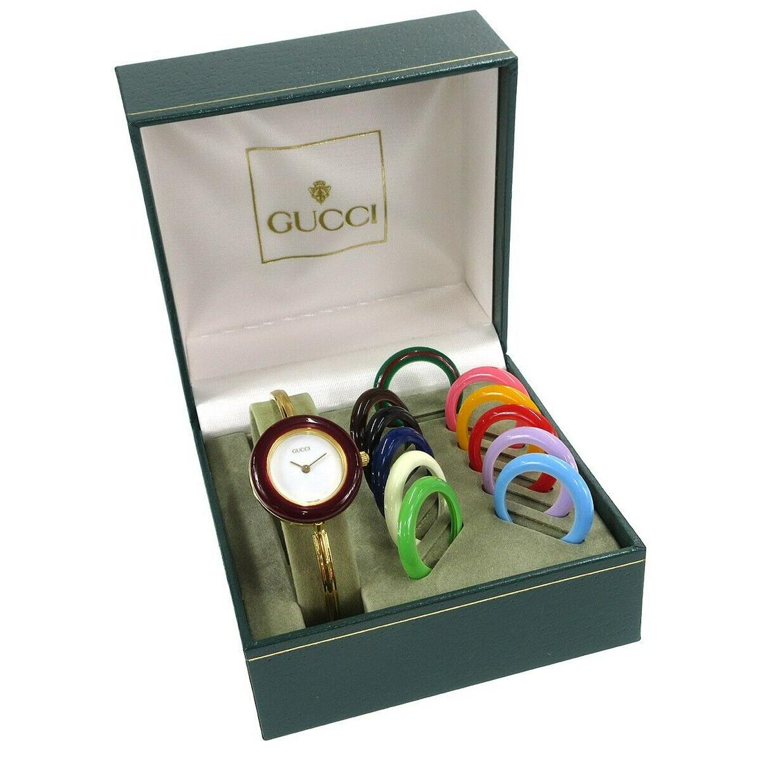 GUCCI 11/12.2 Change Bezel Chameleon Ladies Watch Quartz Gold: GUCCI 11/12.2 Change Bezel Chameleon Ladies Watch Quartz Gold Movement: Quartz (Battery) Indices: Non-Numeric Hour Marks Brand: Gucci Case Color: Gold Type: Wristwatch Band Color: Gold Band Material: