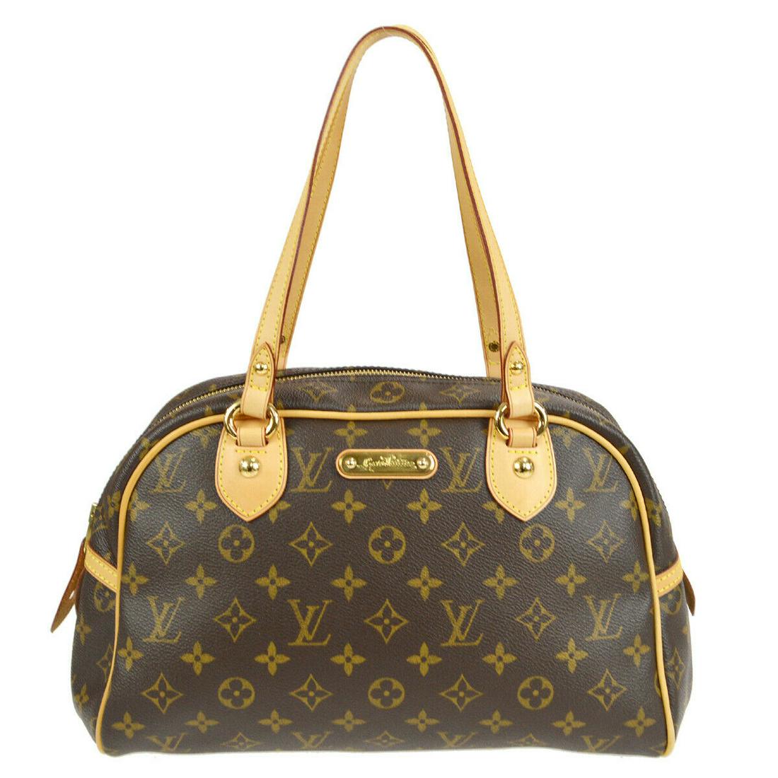 LOUIS VUITTON MONTORGUEIL PM HAND BAG PURSE MONOGRAM CANVAS M95565 SP3098: LOUIS VUITTON MONTORGUEIL PM HAND BAG PURSE MONOGRAM CANVAS M95565 SP3098 Size: Medium Accents: Logo Model: Monogram Style: Hand Bag Handle Style: Double Handles Bag Height: 8.3 Exterior Color: Brown 