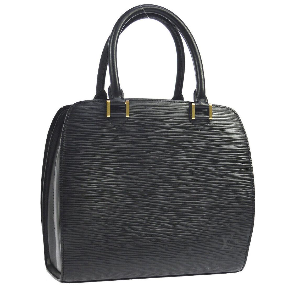 LOUIS VUITTON PONT NEUF HAND BAG BLACK EPI M52052 MI0968 PURSE: LOUIS VUITTON PONT NEUF HAND BAG BLACK EPI M52052 MI0968 PURSE Size: Medium Accents: Logo Model: Epi Handle/Strap Material: Leather Style: Hand Bag Lining Color: Black Inside Pockets: 2 Outside Pocket