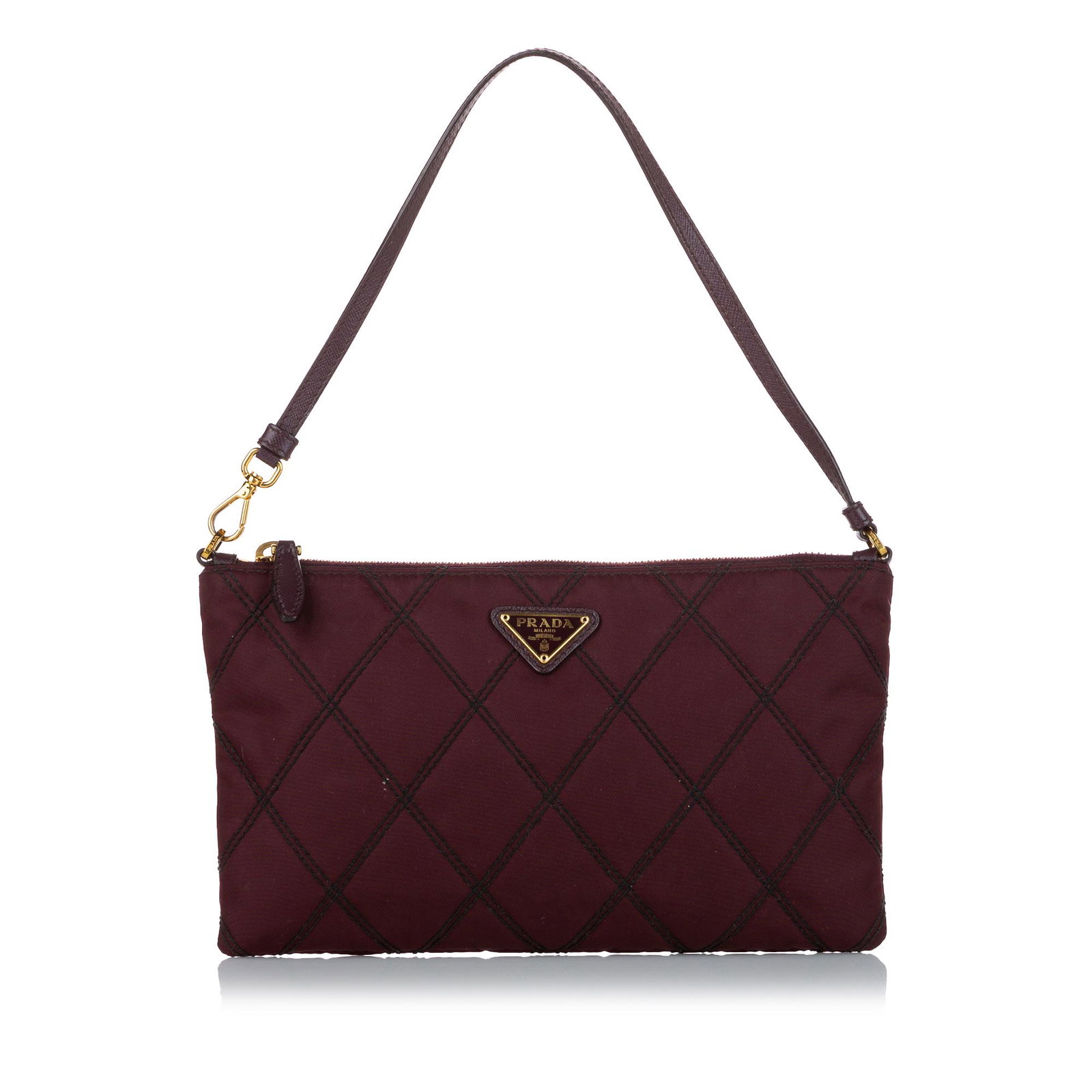 Prada Impuntu Tessuto Baguette: Prada Impuntu Tessuto Baguette This baguette features a quilted nylon body a flat leather strap a top zip closure and an interior zip pocket. Brand: Prada Model: Impuntu Tessuto Baguette Origin: Italy
