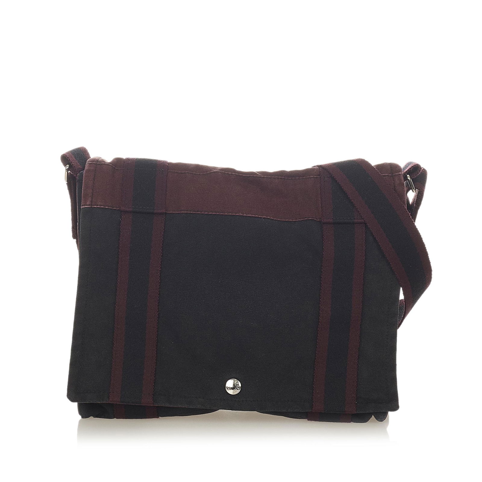 Hermes Fourre Tout Besace PM: Hermes Fourre Tout Besace PM This crossbody bag features a canvas body a flat shoulder strap a front flap with magnetic snap closure and an interior zip pocket. Brand: Hermes Model: Fourre Tout Besace