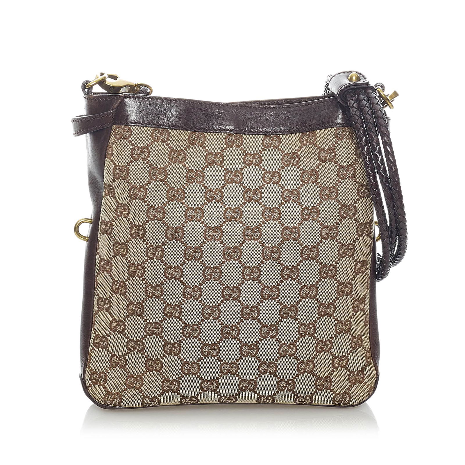 Gucci GG Canvas Crossbody Bag: Gucci GG Canvas Crossbody Bag This crossbody bag features a canvas body with leather trim a braided leather strap an open top with magnetic closure and an interior zip pocket. Brand: Gucci Model: GG C