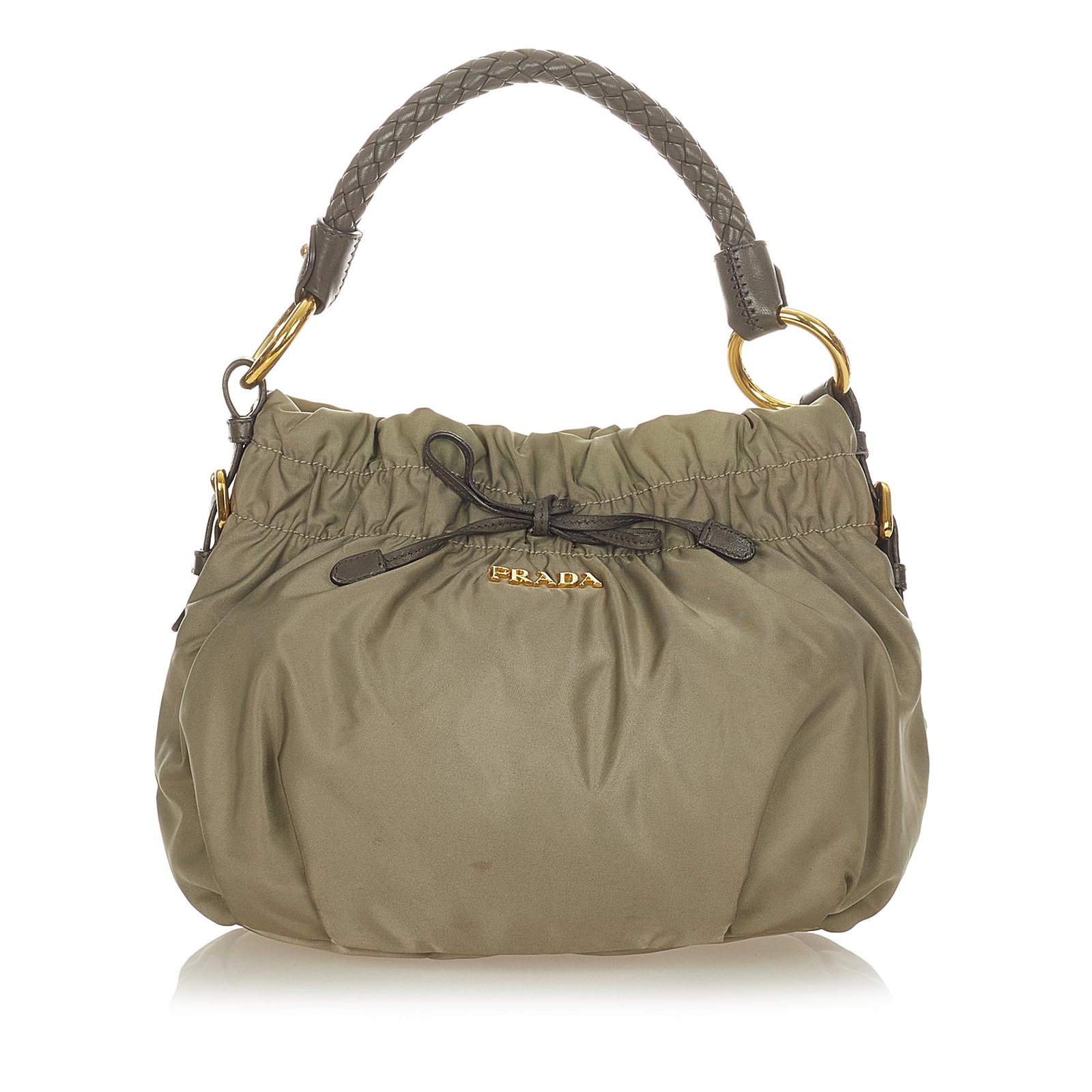 Prada Tessuto Shoulder Bag: Prada Tessuto Shoulder Bag This shoulder bag features nylon body a braided leather handle an open top with a push button closure and an interior zip pocket. Brand: Prada Model: Tessuto Shoulder Bag Or