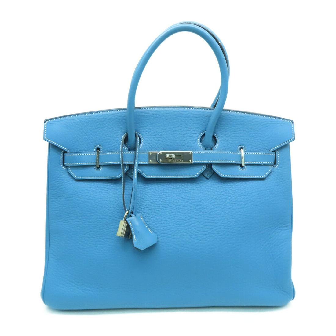 Hermes PHW Birkin 35 Handbag Bleu Jean Taurillon Clemence Leather: Hermes PHW Birkin 35 Handbag Bleu Jean Taurillon Clemence Leather Brand: HERMES Style: Handbag Exterior Material: Calfskin (cowhide) Exterior Color: Blue Bag Height: 6.3 Bag Depth: 7.1 Bag Length: 13.