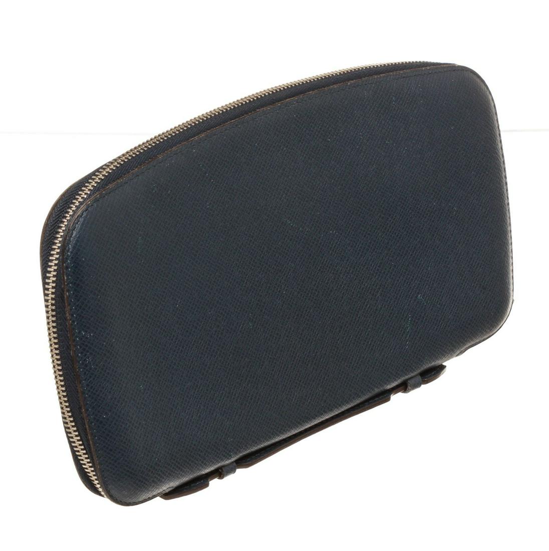 Louis Vuitton Blue Atoll Organizer Wallet: Louis Vuitton Blue Atoll Organizer Wallet Louis Vuitton Blue Atoll Organizer Wallet with material leather gold-tone hardware trim tan vachetta interior cardholder pocket and zipper closure. The BIDHAU