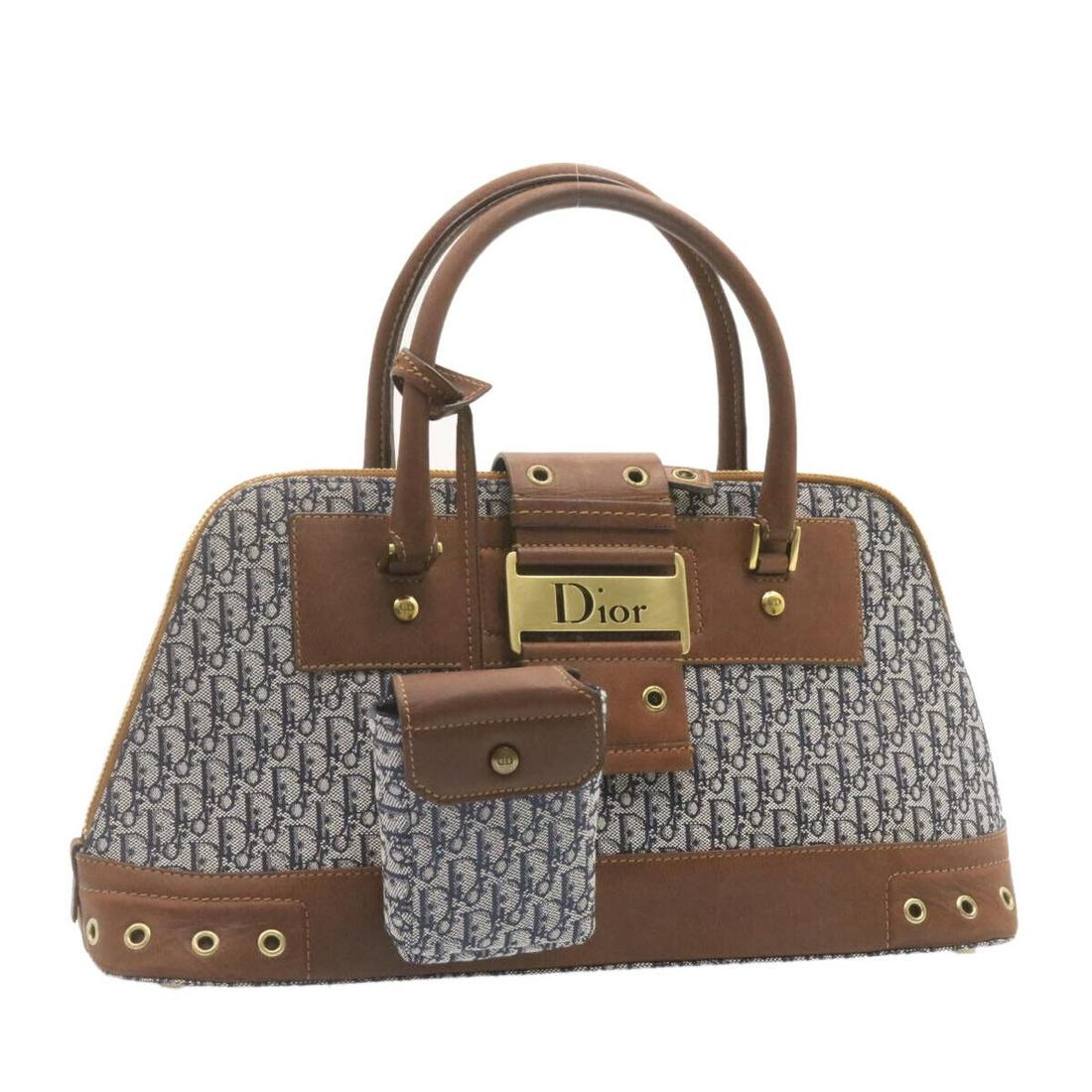 CHRISTIAN DIOR Trotter Canvas Hand Bag Pouch Navy Brown: CHRISTIAN DIOR Trotter Canvas Hand Bag Pouch Navy Brown Brand: Christian Dior Exterior Color: Blue Exterior Material: Canvas Style: Hand Bag Size: W35 x H18 x D14cm(Approx) Type: unknown B: Reasonable