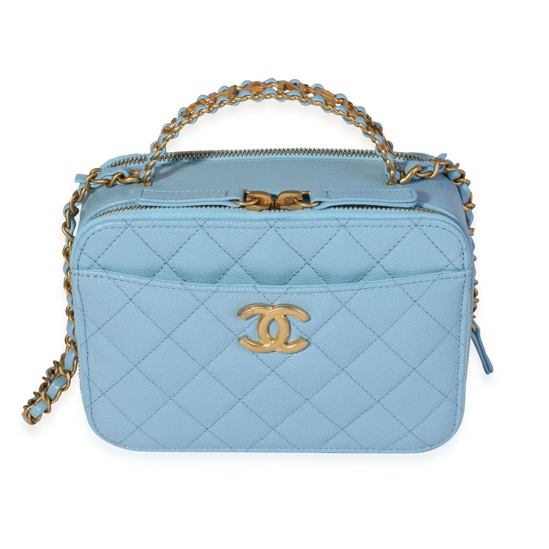 Chanel Light Blue Quilted Caviar Chanel Top Handle Vanity Case: Chanel Light Blue Quilted Caviar Chanel Top Handle Vanity Case Dimensions: 7.5 x 5.5 x 3.25 Handbag Accessories: Box;Dustbag;Gift Ribbon;Care Booklet;Retail Tag Bag Length: 7.5 in Bag Depth: 3.25 in B