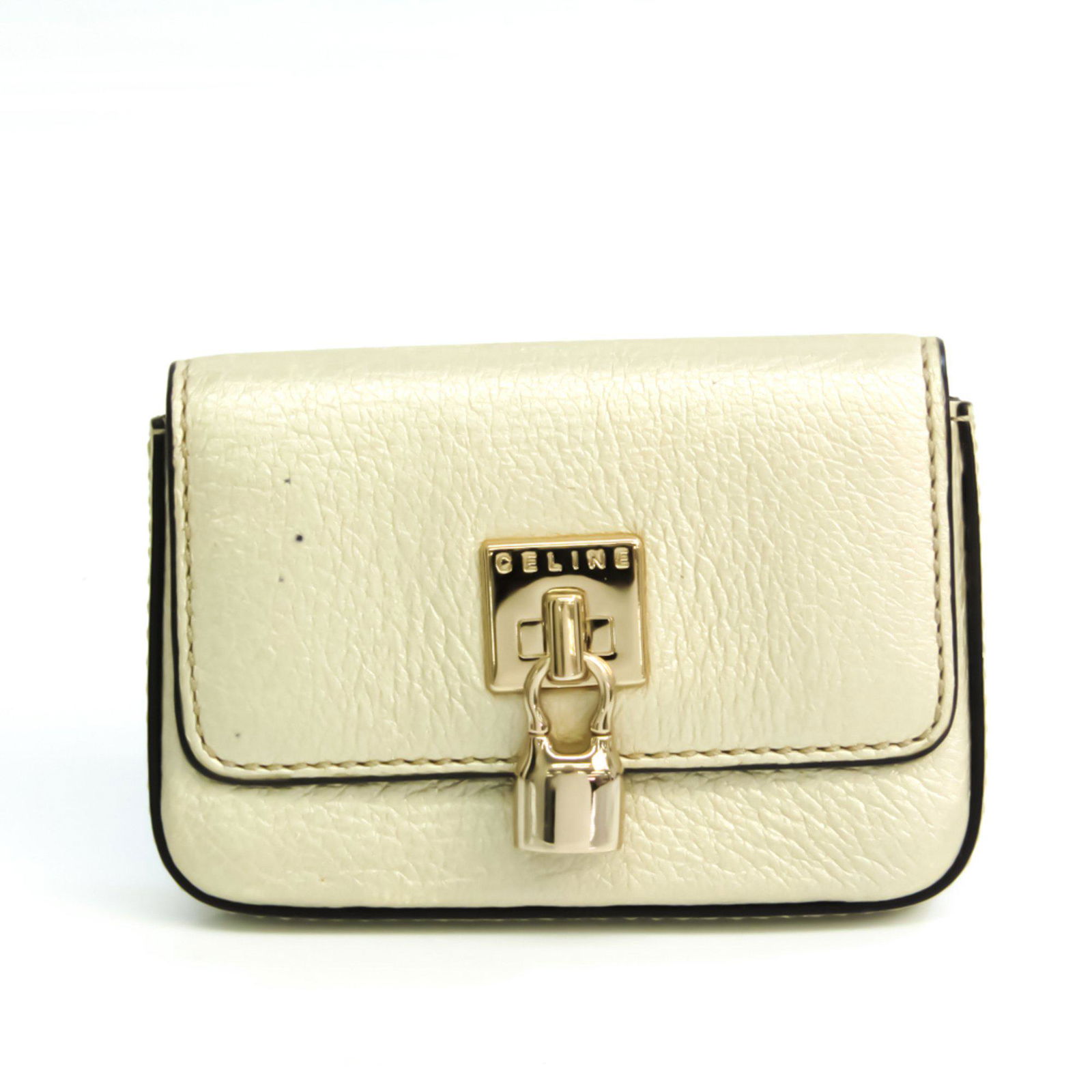 Celine Leather Card Case Gold: Celine Leather Card Case Gold Brand: Celine Country of Origin: China Type: Card case Gender: Unisex Color: Gold Material: Leather Leather: Closure: Flap Snap fastener Open pocket: 1 Size (HxWxD): 7cm