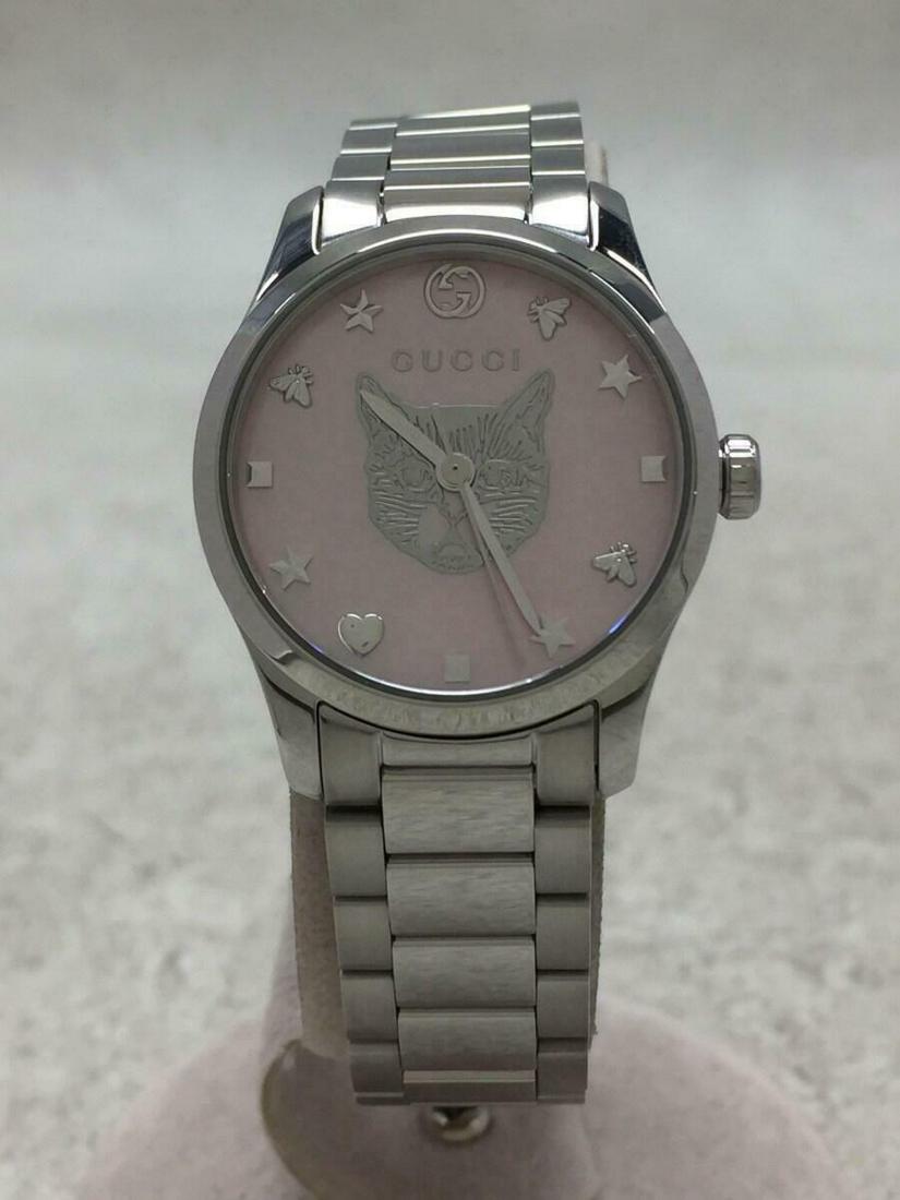 GUCCI Analog Stainless Steel Pink Silver Ladies Watch Pre Owned: GUCCI Analog Stainless Steel Pink Silver Ladies Watch Pre Owned Brand: Gucci Type: Wristwatch Pre-Owned The BIDHAUS Guarantee: All items in this auction are guaranteed to be 100% authentic. At Your Se