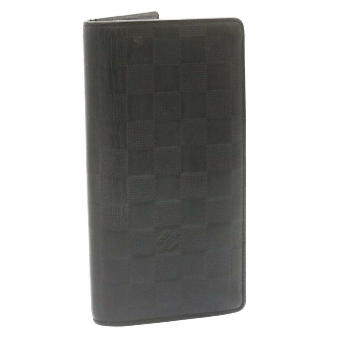 LOUIS VUITTON Damier Infini Portefeuille Brazza Wallet Black N63010: LOUIS VUITTON Damier Infini Portefeuille Brazza Wallet Black N63010 Brand: LOUIS VUITTON Style: Long Wallet Material: Damier Infini Leather Color: Black Bag Height: 3.7inch(Approx) / 9.5cm(Approx) Bag